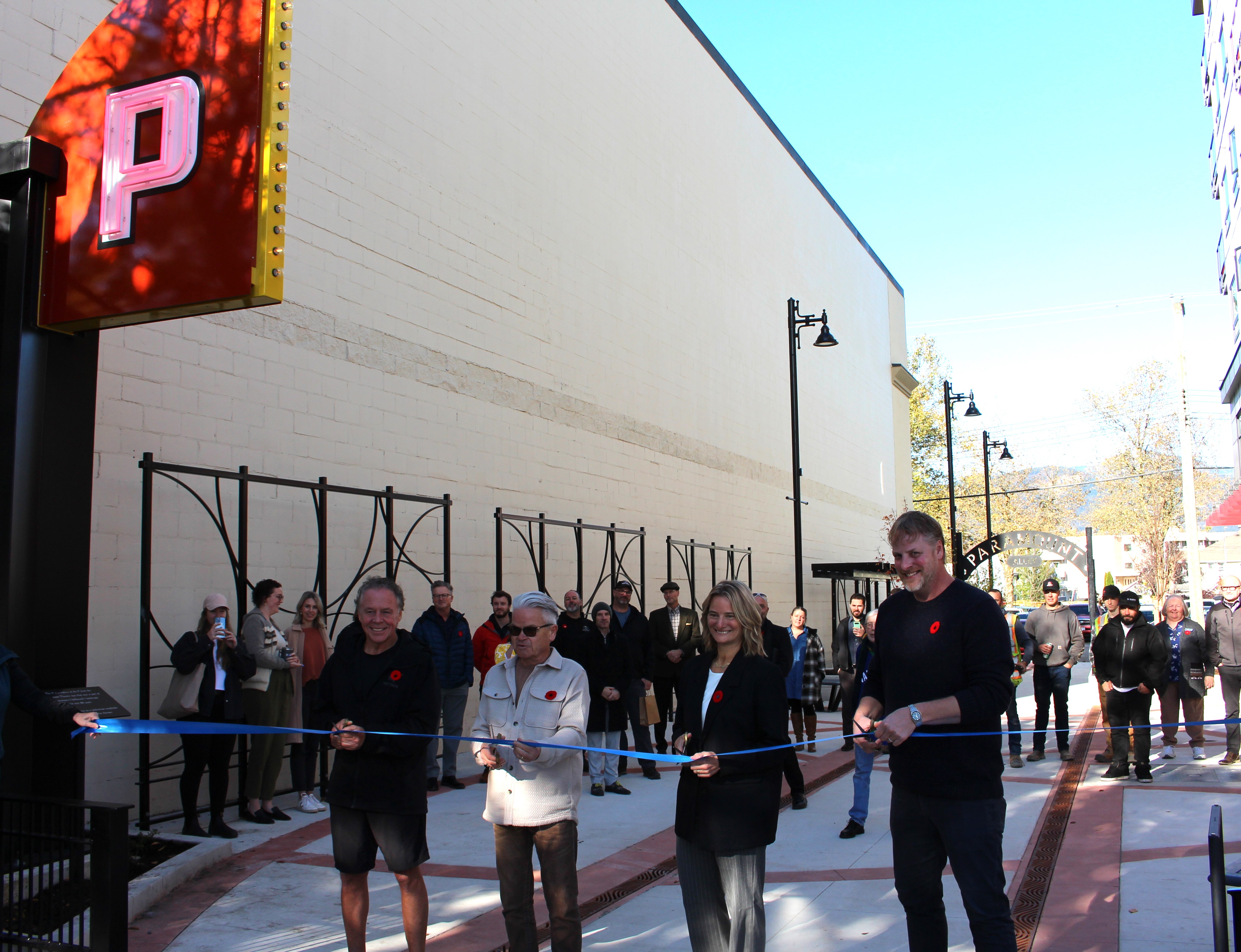 Mayor Popove and Councillors Mercer, Kloot and Read cutting a blue ribbon at the entrance of Paramount Alley 